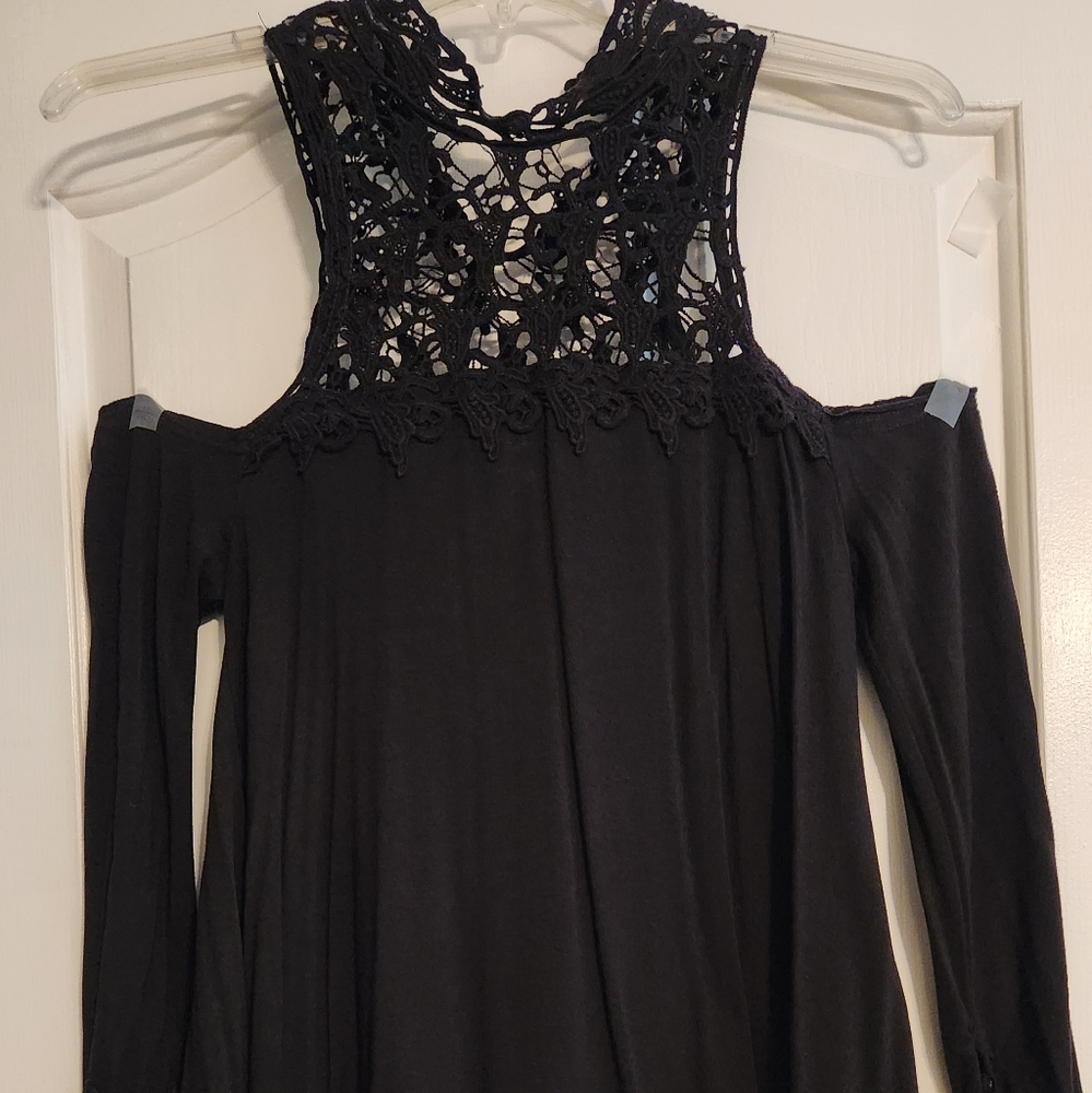 Jersey and lace cold shoulder long sleeve top.